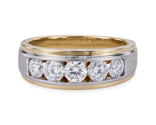 Five lab grown diamonds are handsomely set into this men's ring. The gleaming two toned design brings a modern and bold finish to your look.