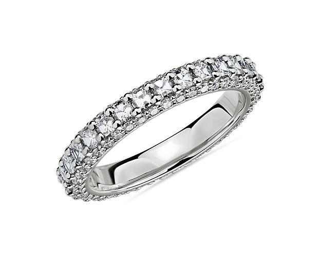 Every piece by Bella Vaughan is handcrafted to be stunning and this gorgeous platinum wedding ring featuring 3 sides of sparkle, asscher diamonds on the top and round accent diamond on either side, is no exception. This wedding ring is a perfect match to the Catarina engagement rings 77070, 77796, & 78827.