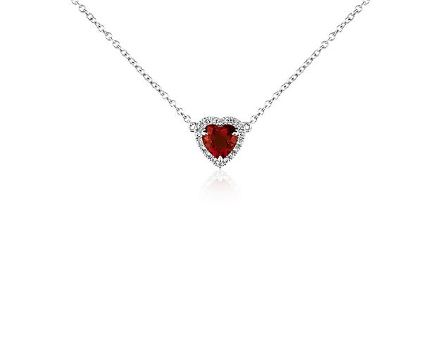 Striking and brilliant, this heart-shaped pendant showcases a rich garnet  framed by micropavé diamonds set in 18k white gold with a matching cable chain necklace.