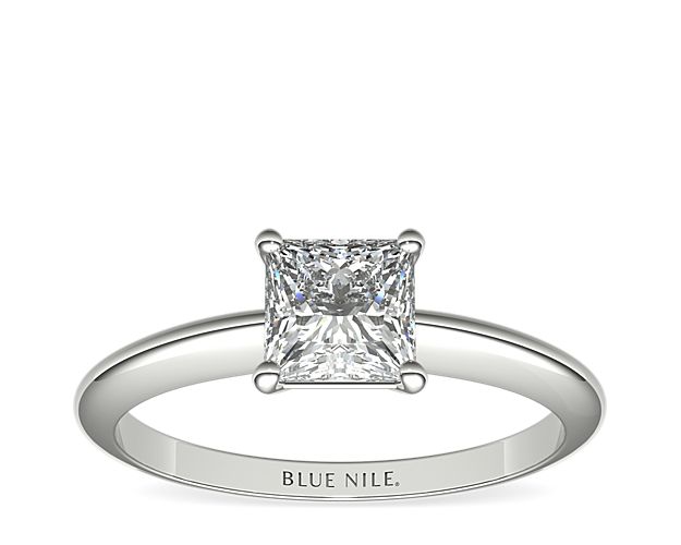 Let your diamond shine brilliantly in this classic platinum four-prong solitaire engagement ring. The slim silhouette and polished finish exemplify timeless style. Select from a variety of diamond shapes to create the perfect classic solitaire engagement ring for you.