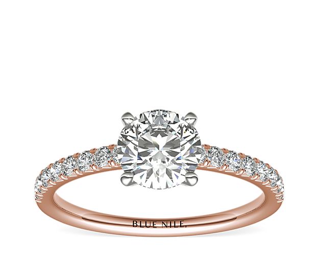 With the perfect hint of pink, this engagement ring showcases French pavé-set diamonds set in 14k rose gold that complement your choice of center diamond.